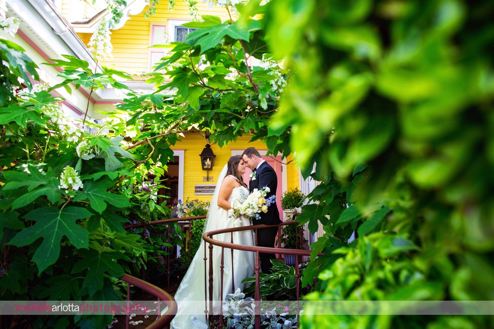 The Gables LBI summer wedding bride and groom portrait in front of inn in Beach Haven NJ