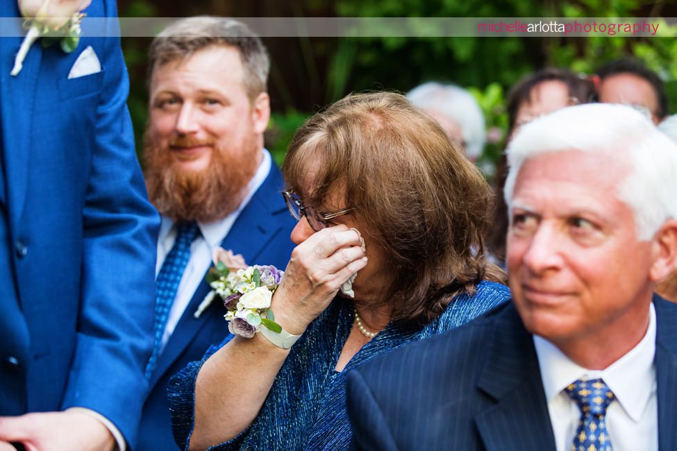 LBI gables NJ wedding ceremony groom's mom wipes away tear