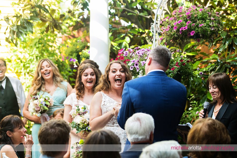 LBI gables NJ wedding ceremony bride laughing during ceremony
