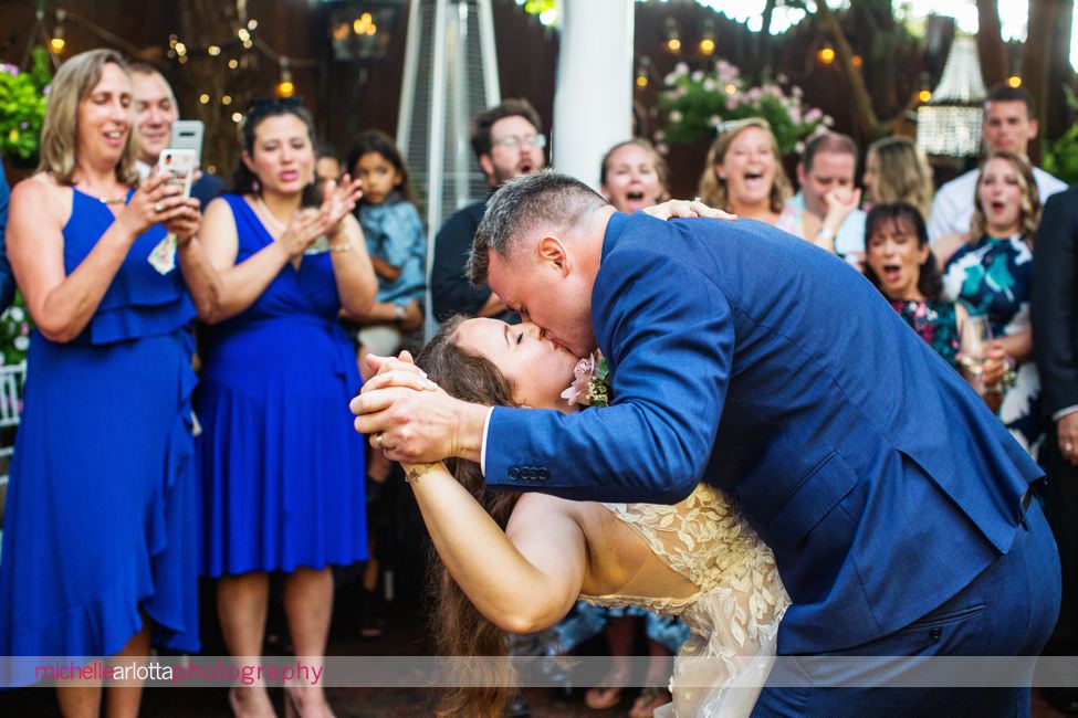 LBI gables NJ outdoor wedding reception groom dips bride at end of first dance