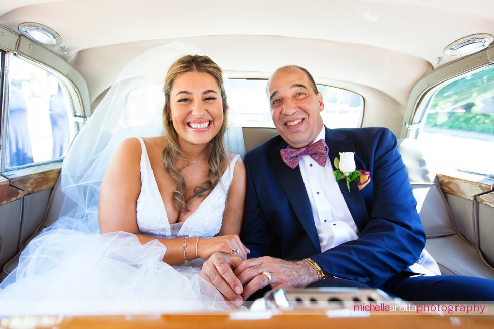 The Farmhouse wedding new jersey church ceremony bride and father in rolls Royce before ceremony starts