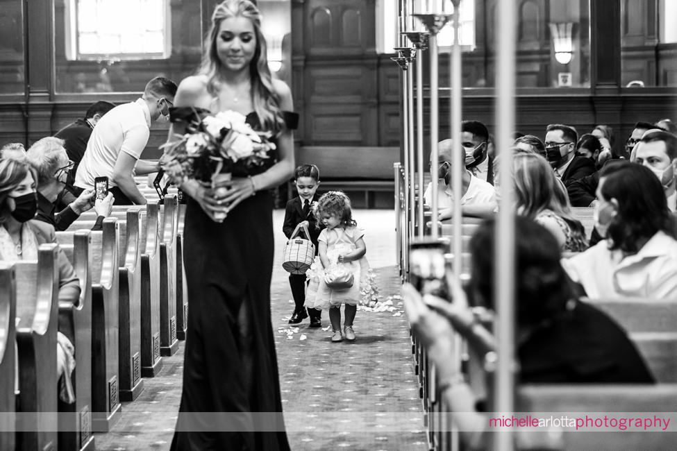 The Farmhouse wedding new jersey church ceremony flower girl and ring bearer walk down aisle