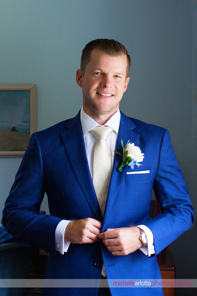 Crystal Point Yacht Club groom portrait blue suit