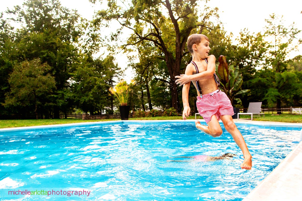 NJ candid family photography jumping in the pool