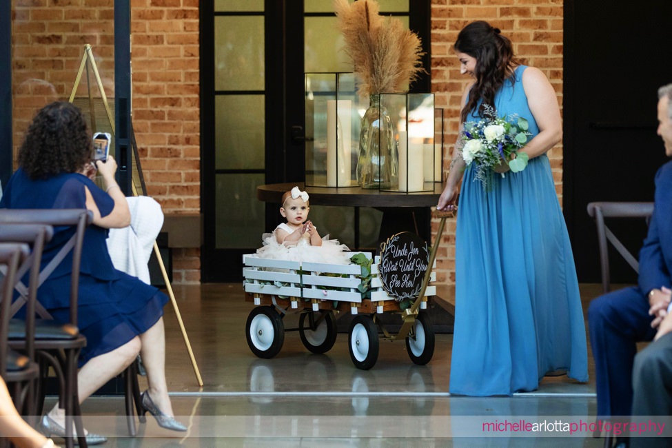 refinery at perona farms New Jersey wedding ceremony baby in wagon