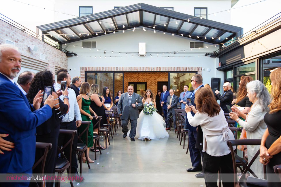 refinery at perona farms New Jersey wedding ceremony bride walks down the aisle