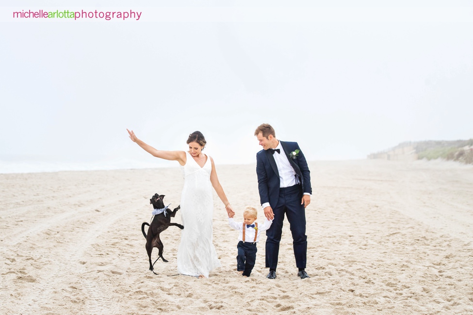 Brant Beach yacht Club LBI NJ wedding bride groom son and dog on beach