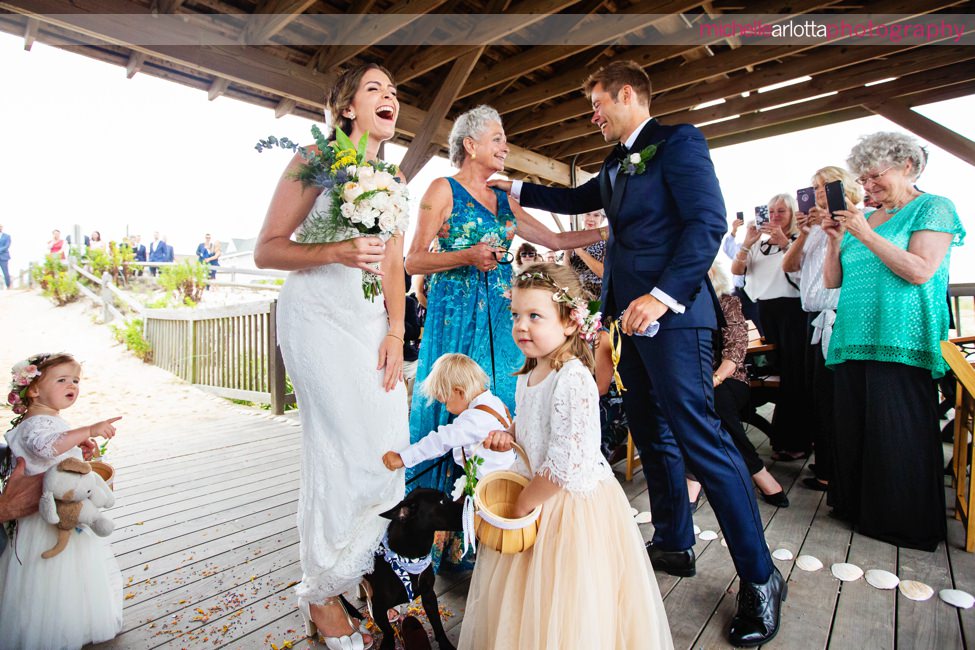 LBI Pearl Street Pavilion NJ wedding ceremony bride is met with dog and son at altar