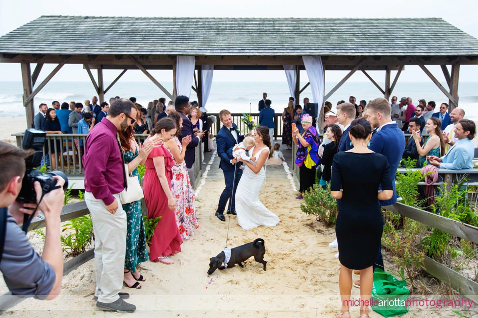 LBI Pearl Street Pavilion NJ wedding ceremony bride and groom exit with dog and son
