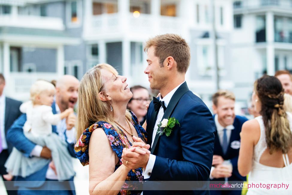 Brant Beach yacht Club LBI NJ wedding reception groom and mother dance outside