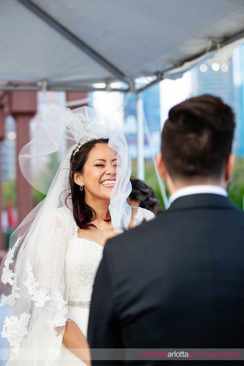 Liberty House intimate NJ Wedding ceremony veil blowing into bride's face