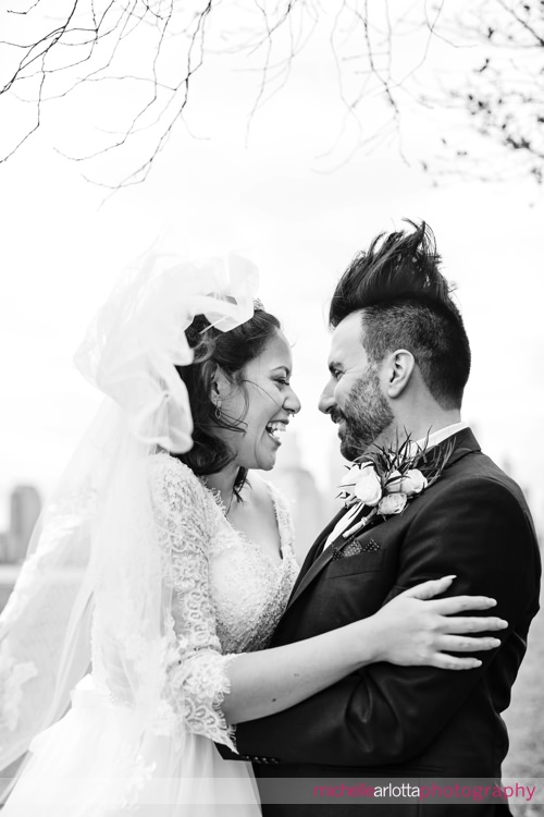 Liberty House Intimate NJ Wedding bride and groom portrait wind blowing groom's hair straight up in the air