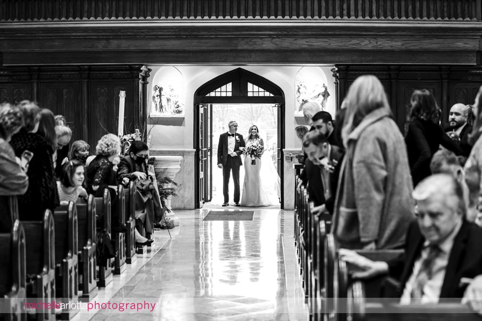 St. Thomas of Villanova church winter wedding bride and father at end of aisle