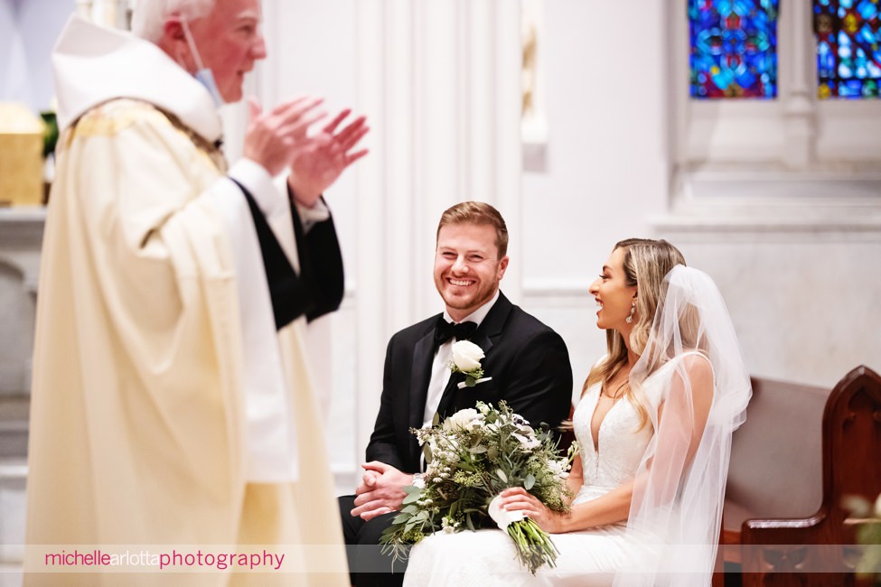 St. Thomas of Villanova church wedding bride and groom laughing