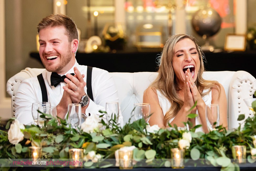The Notary Hotel Pennsylvania wedding bride and groom laughing during toasts