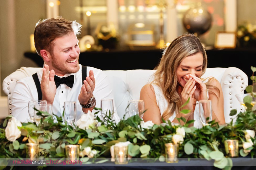 The Notary Hotel Pennsylvania wedding reception bride and groom laughing during toasts