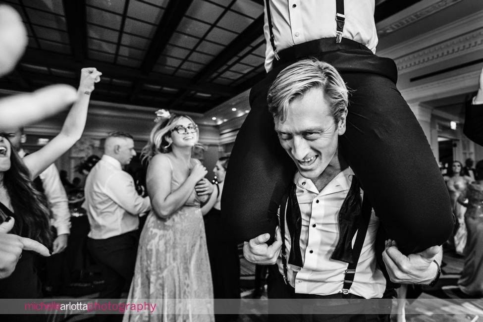 The Notary Hotel PA wedding reception dancing groom on guest's shoulders