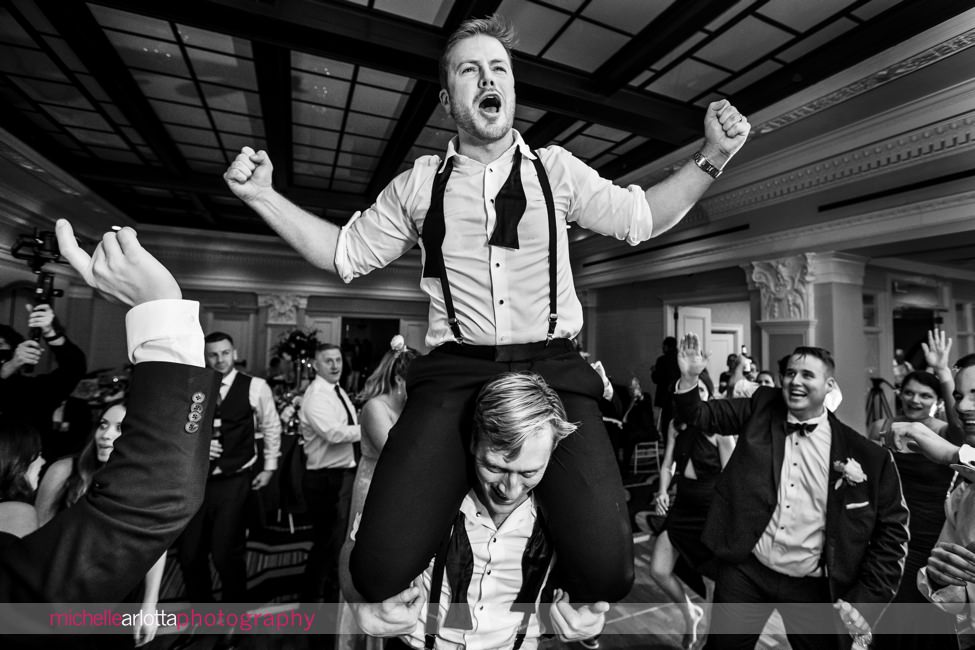The Notary Hotel PA wedding reception dancing groom on guest's shoulders