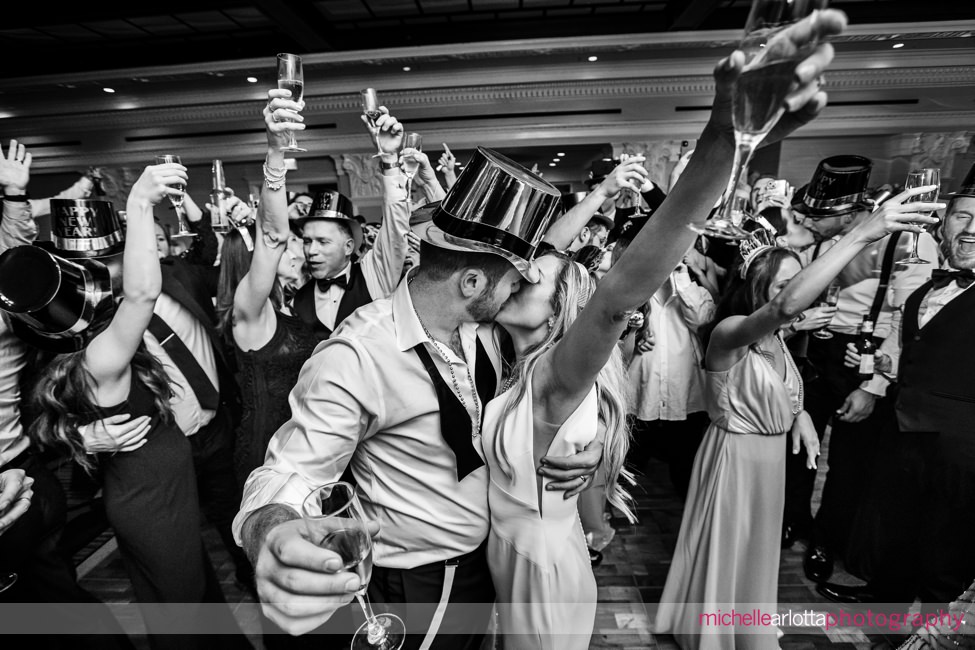 The Notary Hotel PA wedding reception dancing new year's eve bride and groom kissing at midnight