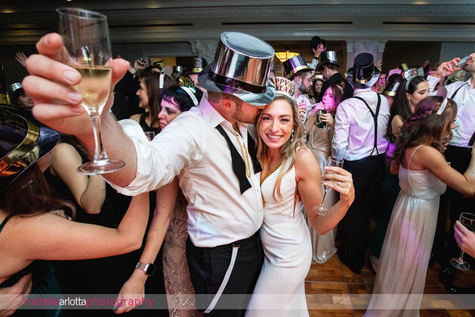 The Notary Hotel PA wedding reception dancing new year's eve bride and groom kissing at midnight 