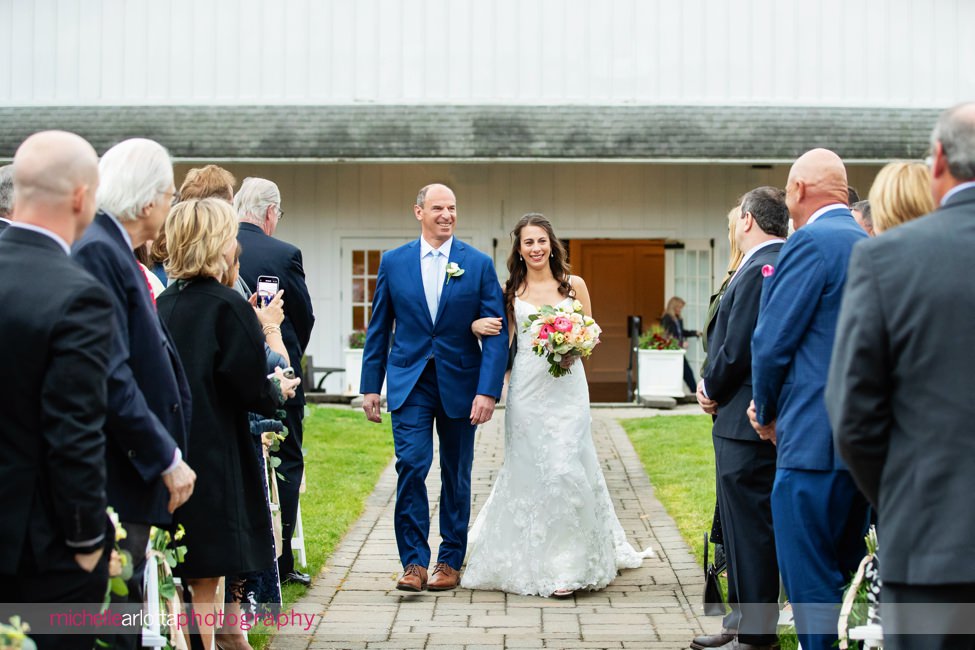 Landmark Venues The Farmhouse NJ outdoor spring wedding ceremony bride walking down the aisle