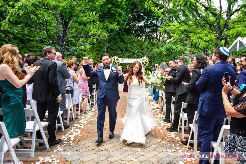 outdoor NJ wedding ceremony at Florentine Gardens bride and groom exit