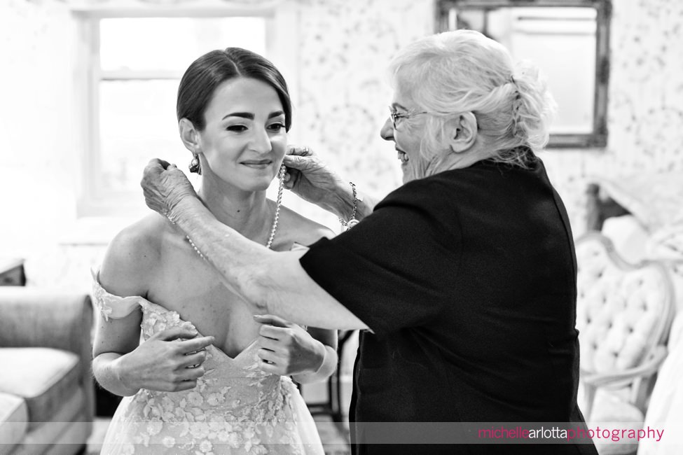 North Shore House NJ bride prep grandmother helps with necklace