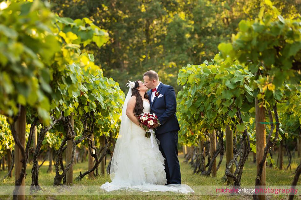 Renault Winery Summer Wedding bride and groom portraits among the vines