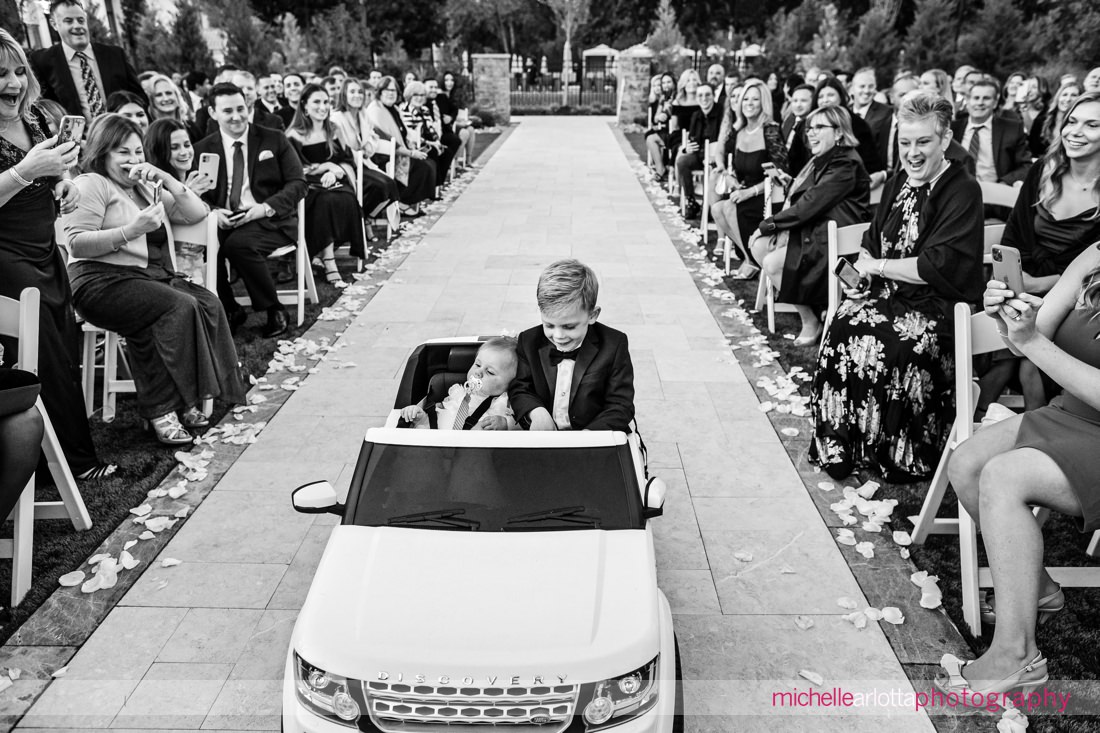 Edgewood Country Club wedding NJ outdoor wedding ceremony ring bearer and flower girl ride down aisle in little car