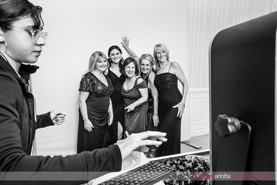 New Jersey wedding reception group in a photobooth