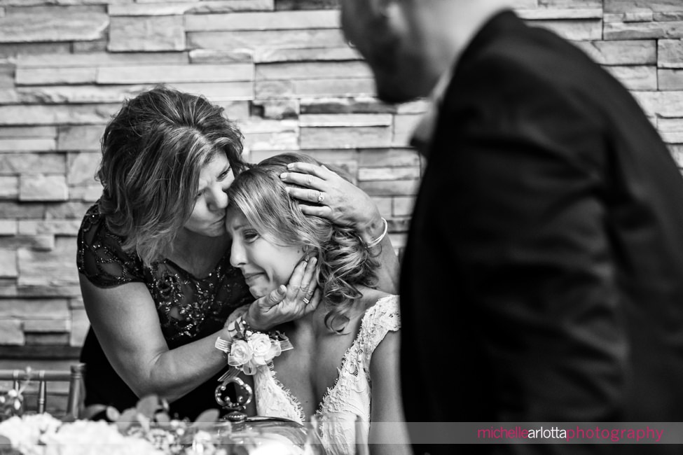 The Madison Riverside NJ wedding reception mother of groom and bride sharing a moment