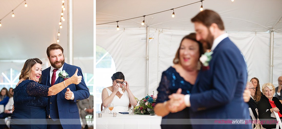 Pat's 30 acres wedding NJ tented reception bride wipes tears as groom dances with his mom