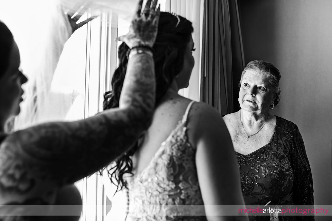 The Breakers hotel nj bride prep mother of the bride watches as veil is put on bride