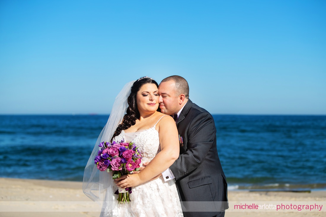 The Breakers by the ocean nj wedding bride and groom beach portrait