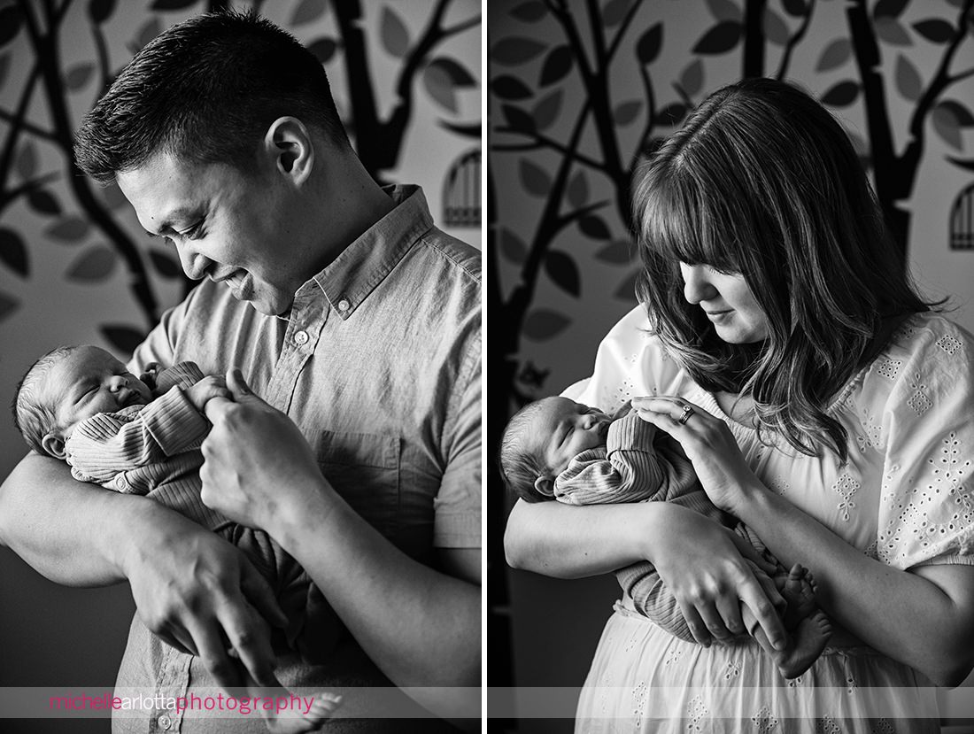 newborn NJ family session dad making funny faces at son