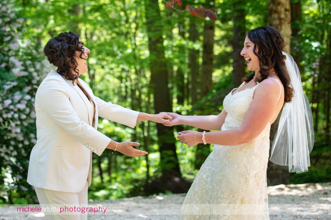 brides see each other during their first look for New Paltz NY wedding