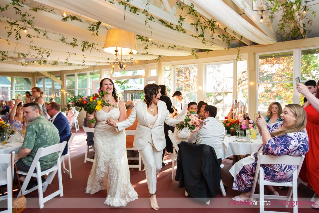 two brides entering wedding reception at Garvan's Gastropub New Paltz NY