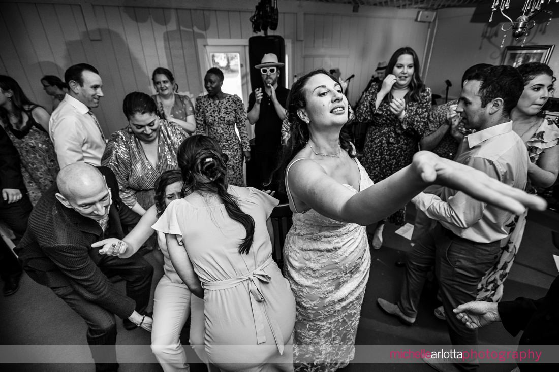 wedding guests having fun during the hora Garvan's Gastropub in New Paltz NY