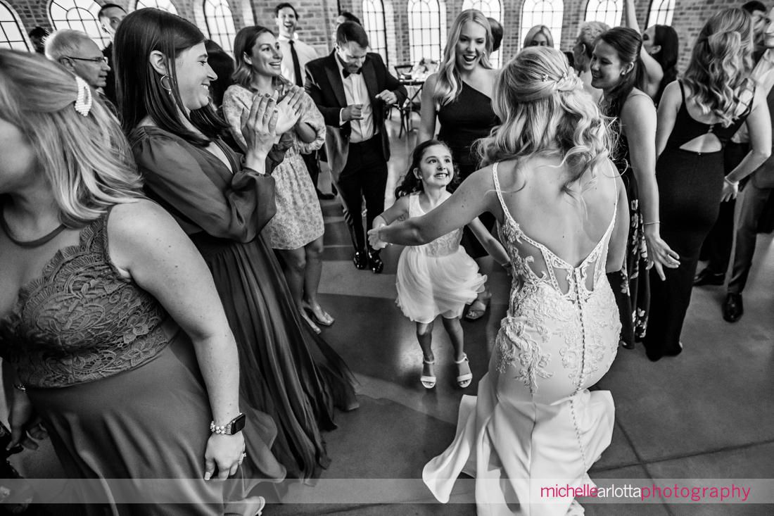 Perona Farms Refinery NJ wedding reception dancing bride dances with flower girl
