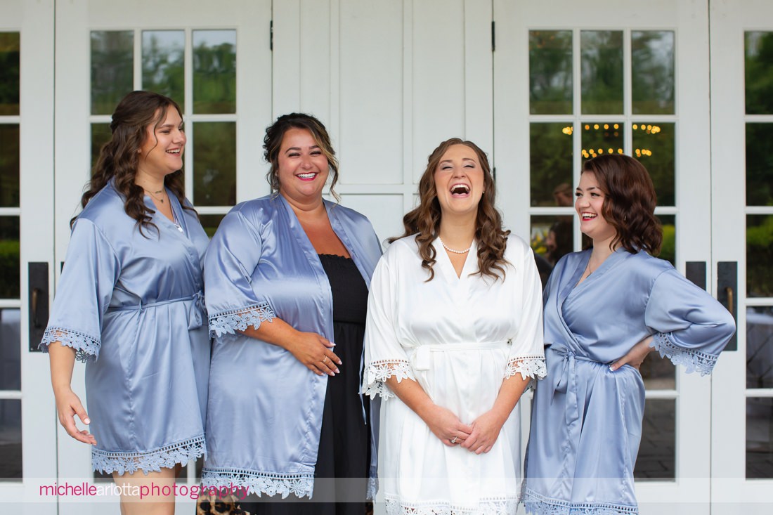 The Farmhouse NJ wedding bride with bridesmaids in matching robes