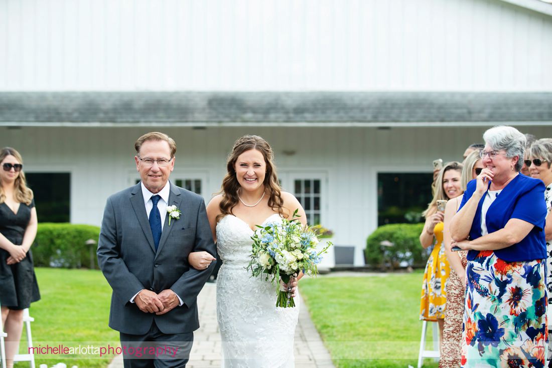 Outdoor wedding ceremony at The Farmhouse NJ summer wedding bride walking down the aisle