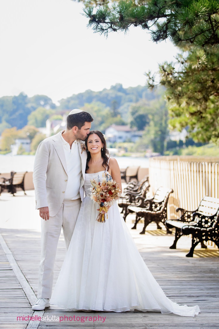 Lake Mohawk Country Club Fall bride and groom portrait on boardwalk in New Jersey