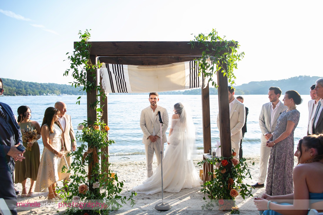 bride circles groom 7 times at start of jewish NJ Lake Mohawk Country Club lakeside wedding ceremony