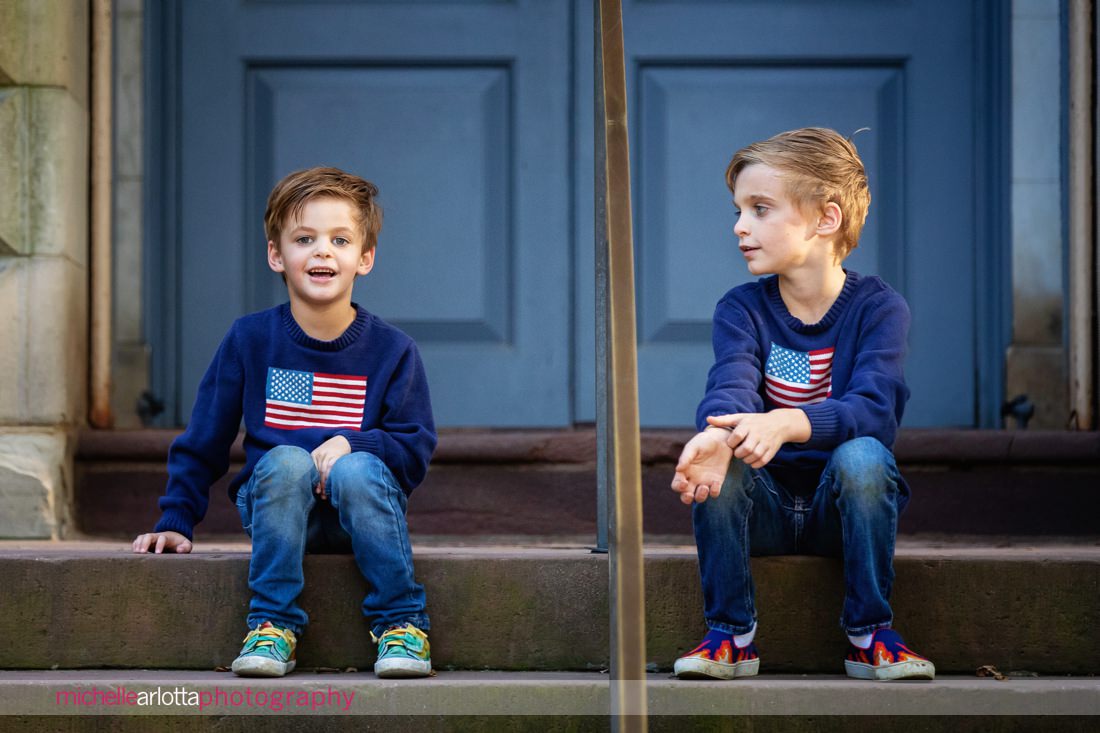brothers sitting on stairs during Princeton university family photo session