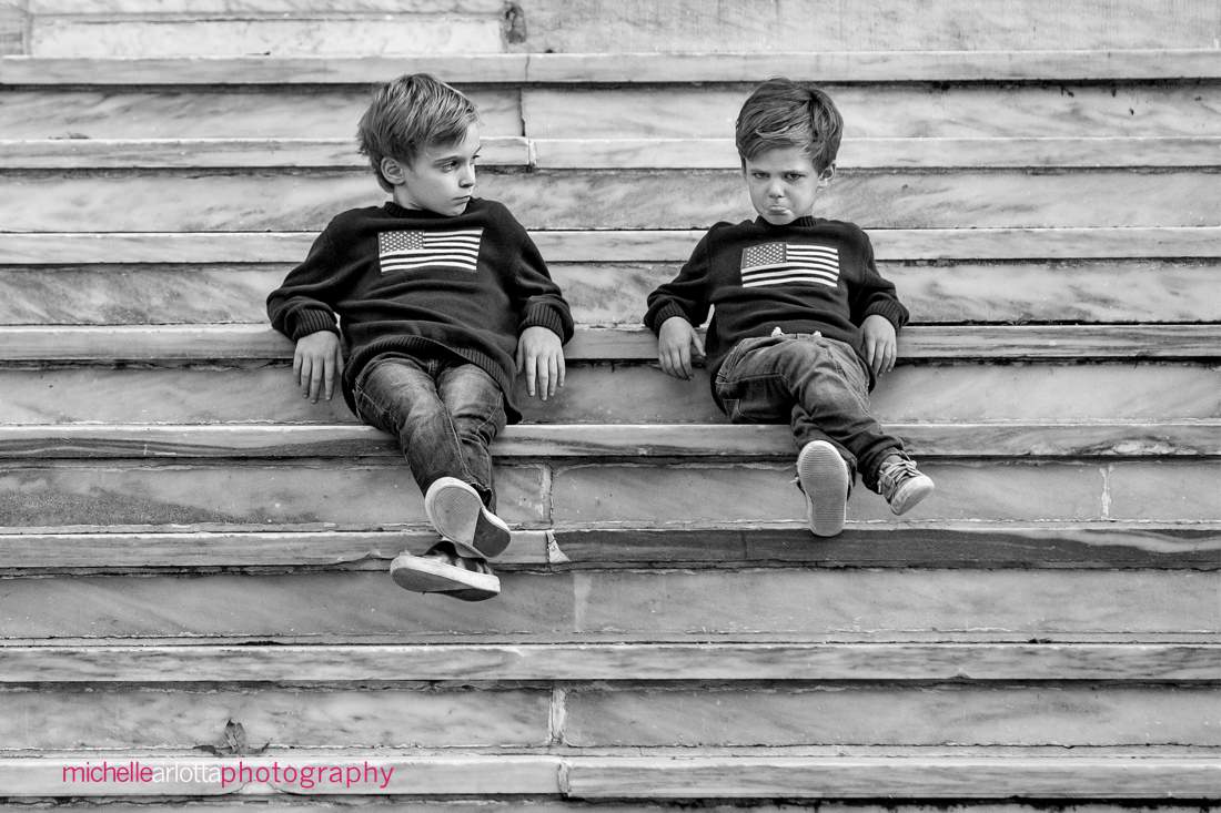 brothers sitting on stairs during Princeton university family photo session