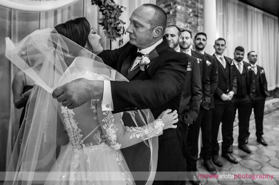 The Shore Club NJ wedding ceremony father hugs bride at the altar