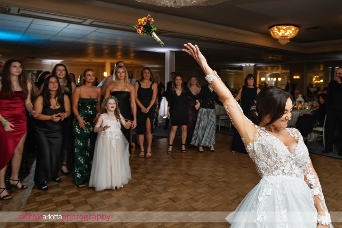 The Shore Club Spring Lake NJ wedding reception bride tosses bouquet