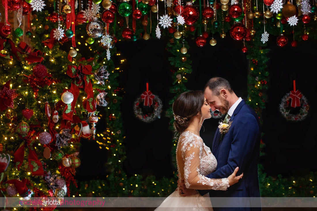 The Shore Club Spring Lake NJ winter wedding portrait of couple with Christmas ornaments