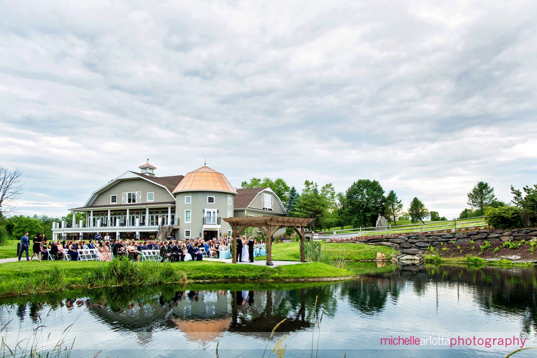 wide shot of bear brook valley nj wedding during ceremony