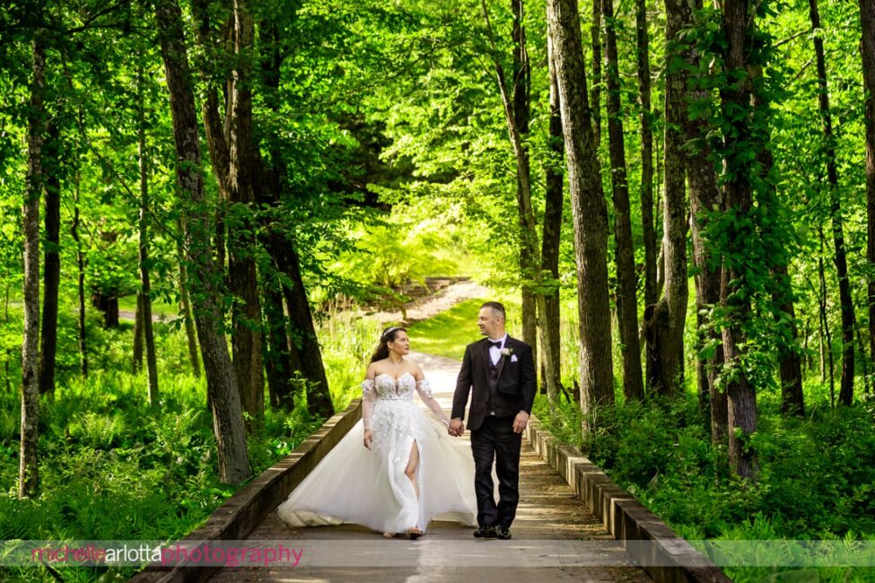 Venue at Winding Hills wedding Montgomery NY bride and groom portrait on bridge